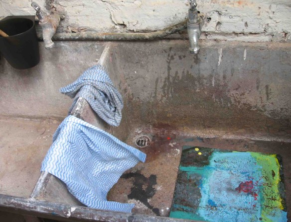 Water, cloths, sink and block.